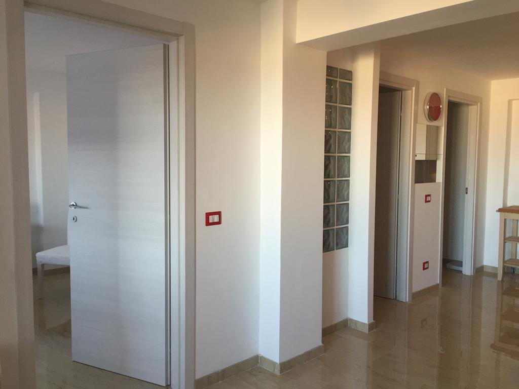 Baia Giardini Apartments Bagian luar foto