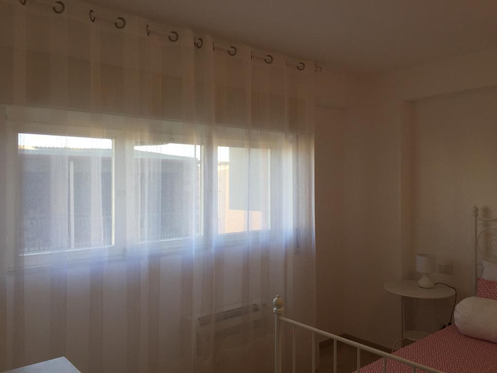 Baia Giardini Apartments Bagian luar foto